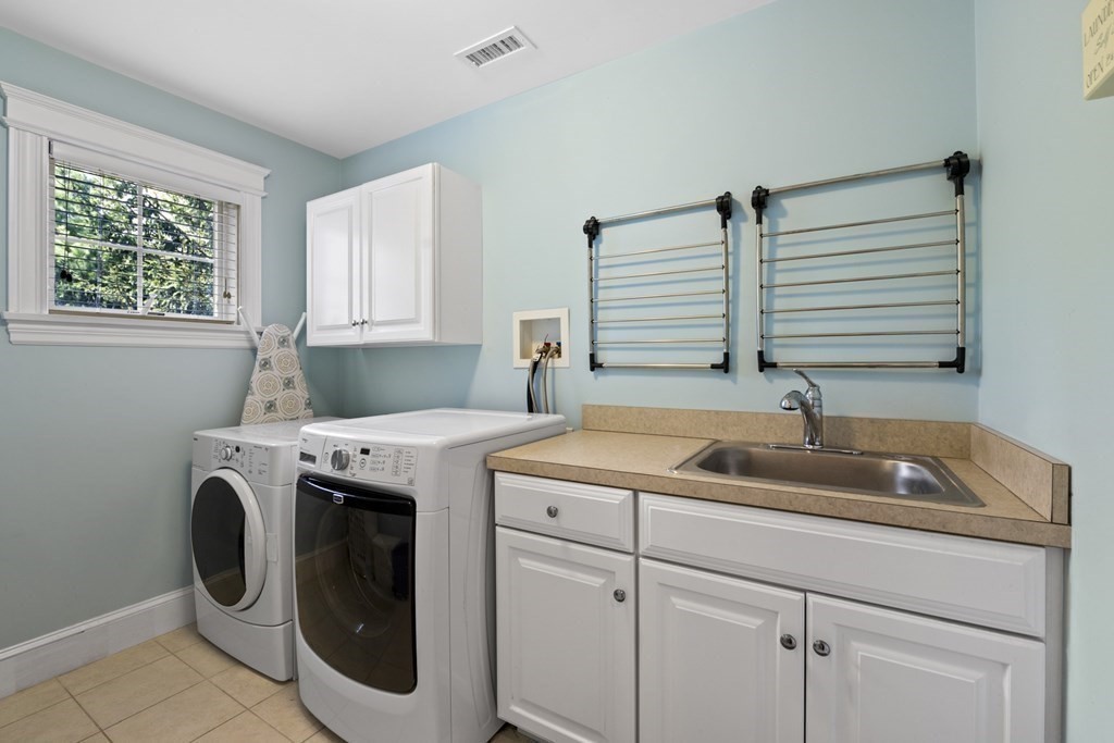 6 Captains Walk Lane Marblehead, MA 01945 - Photo 38 of 39 a utility room with dryer and washer