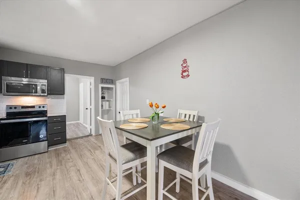 a view of a dining room with furniture