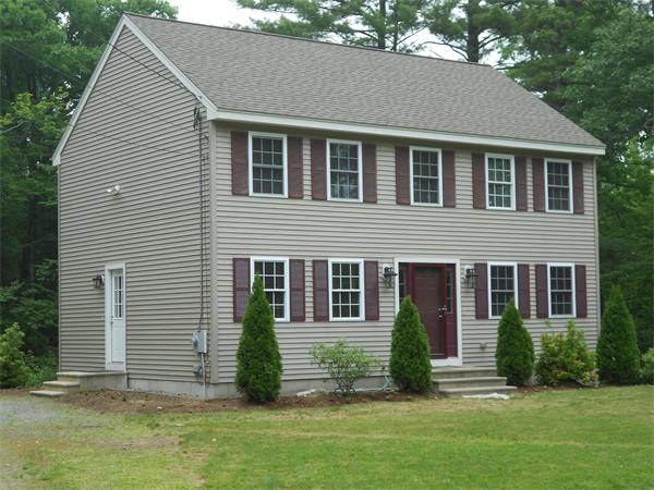 362 Simonds Road Ashby, MA 01431 - Photo 12 of 14 a view of a house with a yard