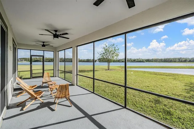 a view of a floor to ceiling window and a table