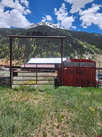 a view of backyard with green space