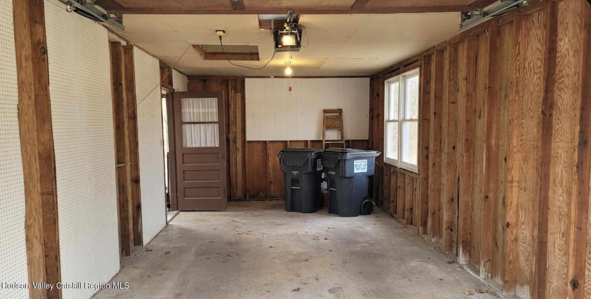 97 Ruby Road Kingston, NY 12401 - Photo 12 of 25 a view of a hallway with closet and furniture