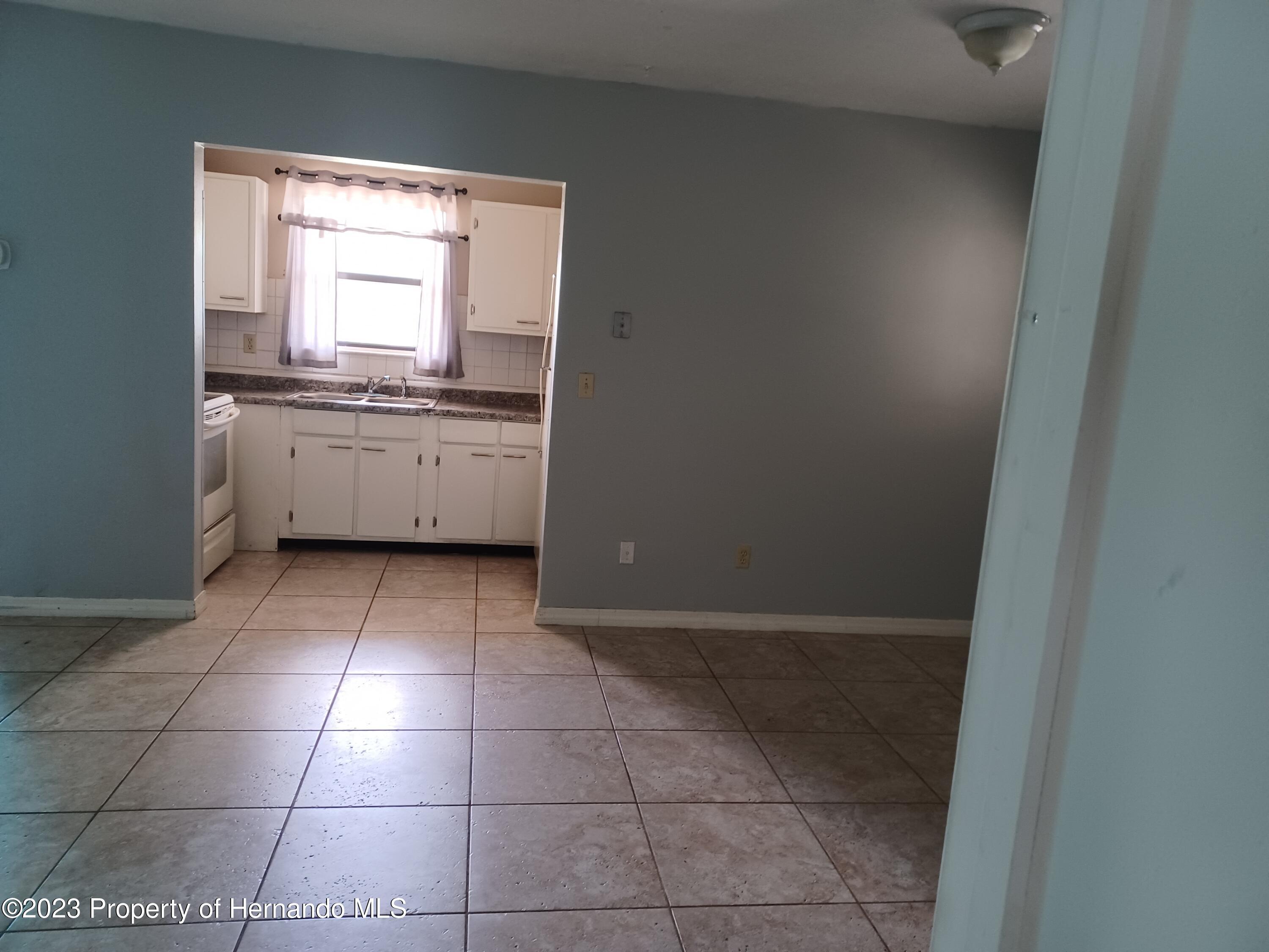 595 Swallow Lane Spring Hill, FL 34606 - Photo 10 of 24 20230721_124608