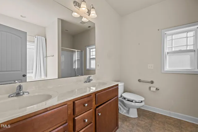 $320,000 | 309 Coachmans Trail, Stem, NC 27581