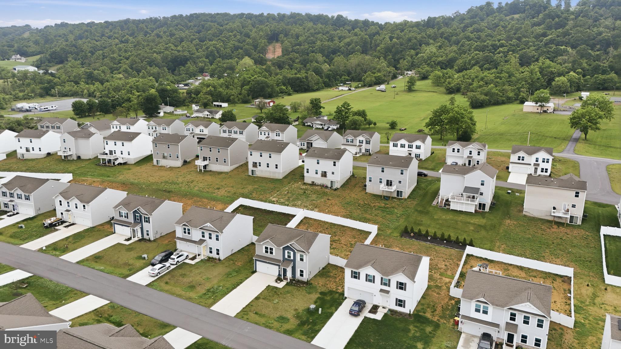 76 Diving Scaup Road Hedgesville, WV 25427 - Photo 43 of 48 an aerial view of a house with garden view