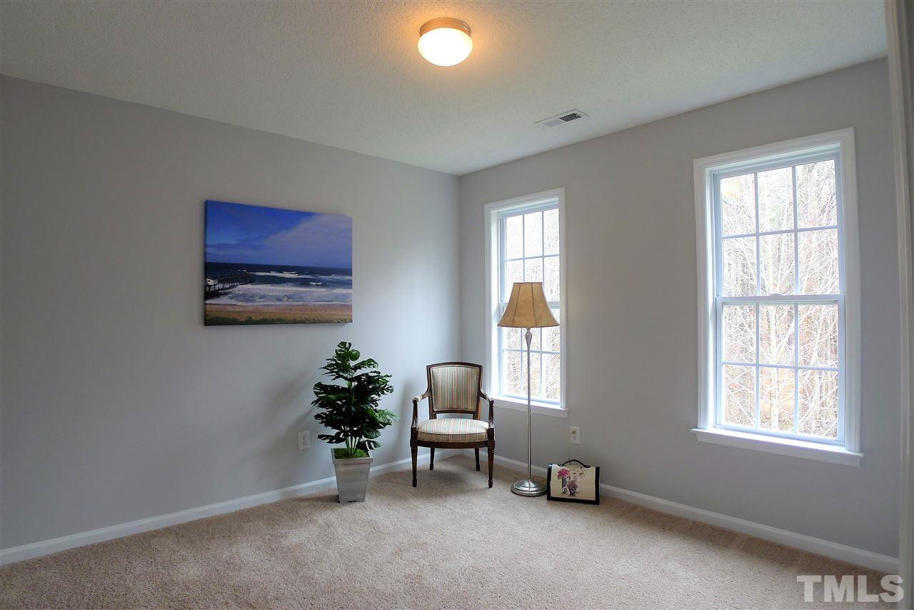 208 Muirfield Ridge Drive Garner, NC 27529 - Photo 16 of 30 a living room with furniture