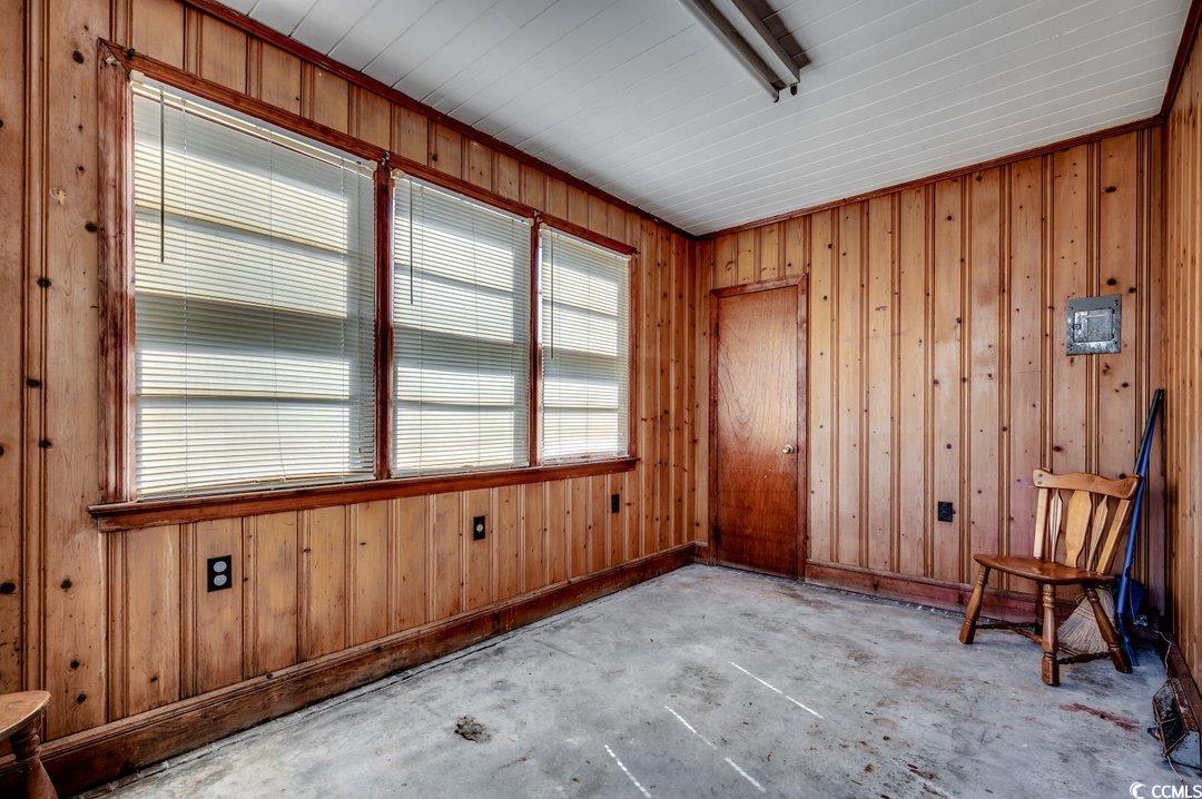 4278 Thomas Street Loris, SC 29569 - Photo 15 of 24 Empty room with wooden walls