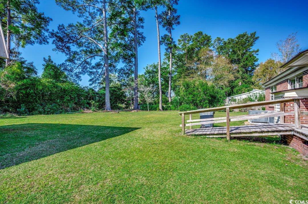 4278 Thomas Street Loris, SC 29569 - Photo 19 of 24 View of yard featuring a wooden deck