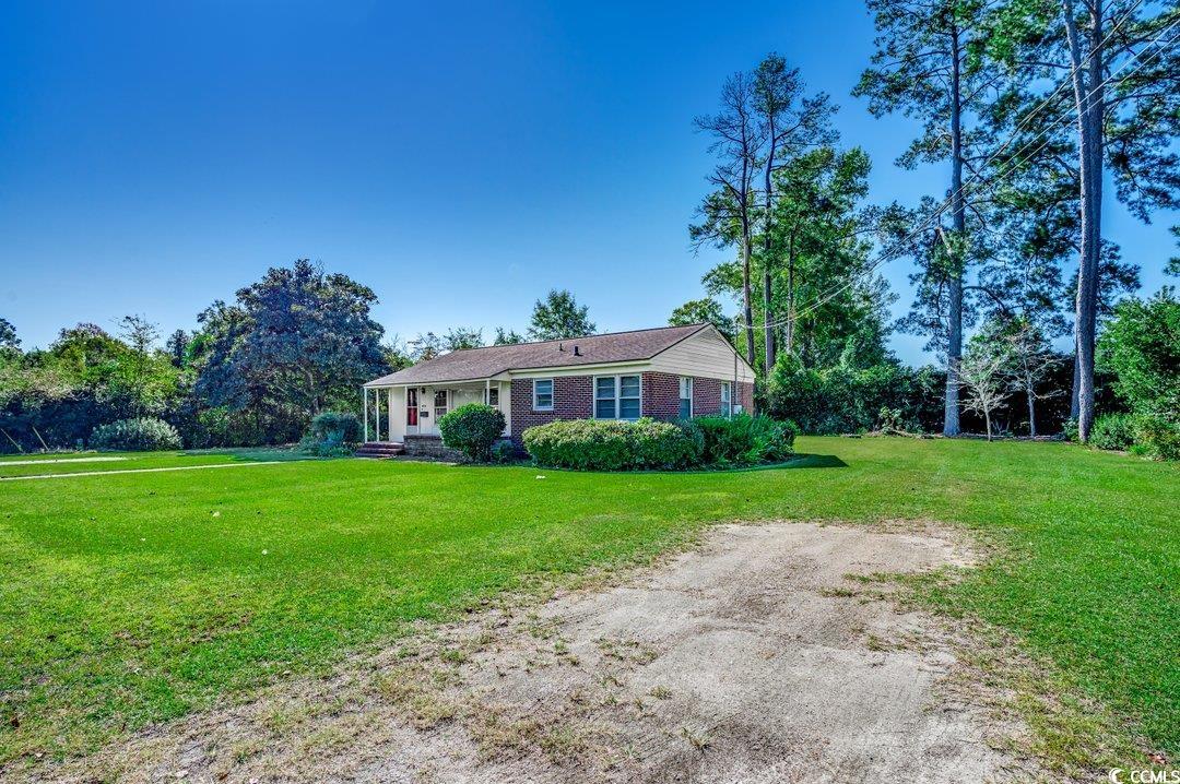4278 Thomas Street Loris, SC 29569 - Photo 22 of 24 Ranch-style home with a front yard