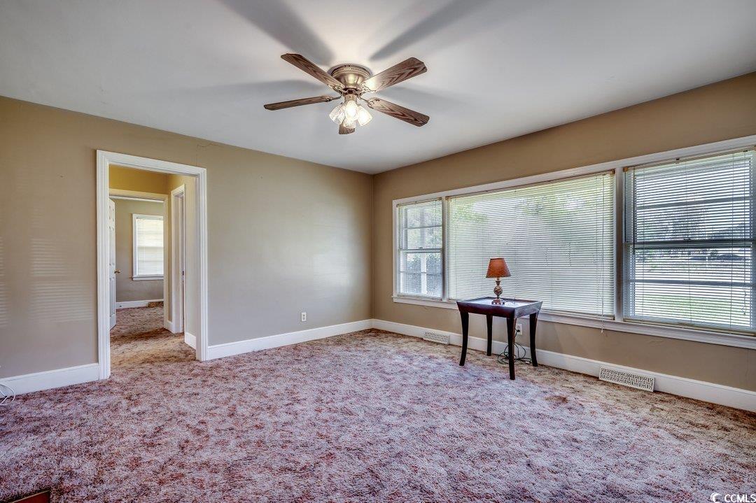 4278 Thomas Street Loris, SC 29569 - Photo 5 of 24 Unfurnished room with ceiling fan, light colored c