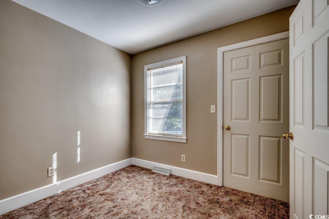4278 Thomas Street Loris, SC 29569 - Photo 6 of 24 Empty room with carpet