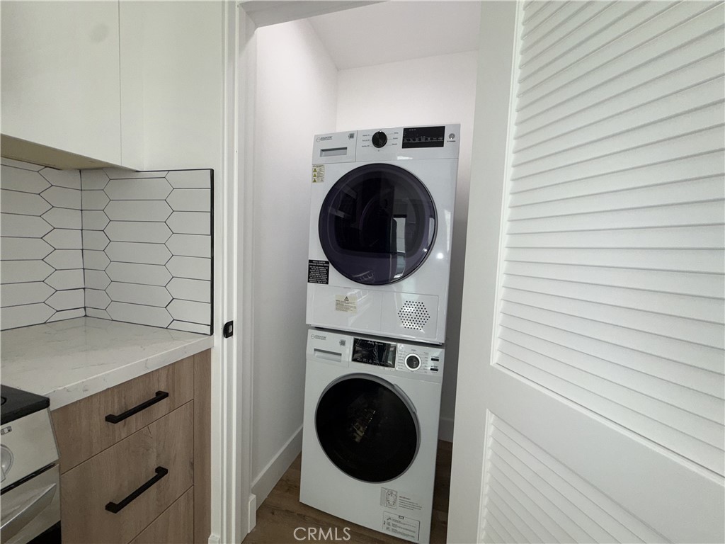 4454 Clinton Street, Unit 1/2 Los Angeles, CA 90004 - Photo 9 of 12 a utility room with dryer and washer