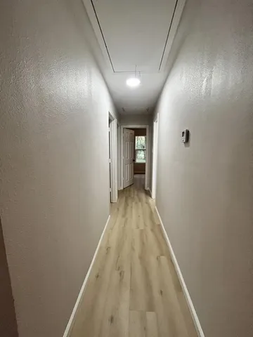 a view of hallway with stairs