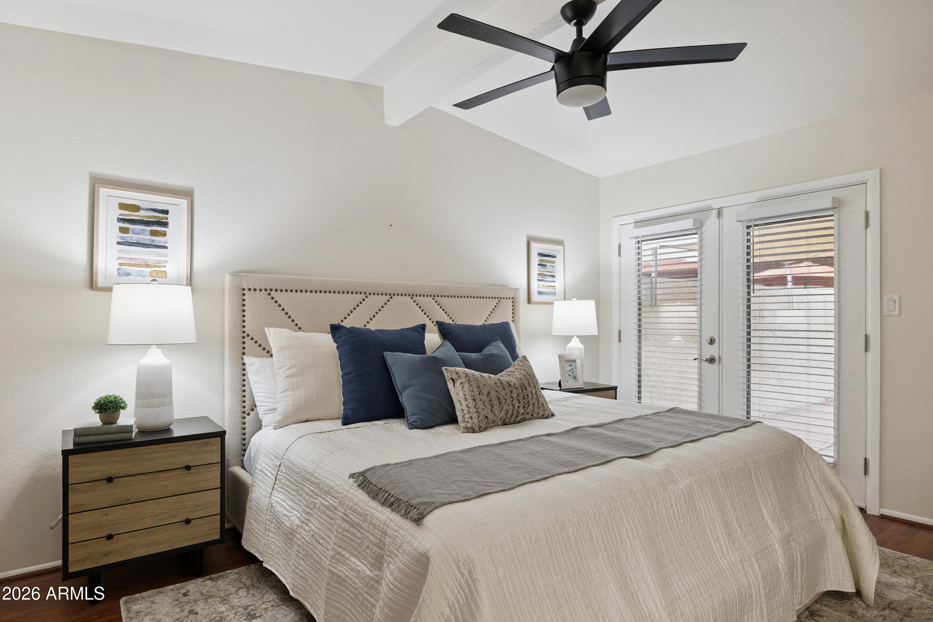 4343 East Osborn Road Phoenix, AZ 85018 - Photo 9 of 41 a bedroom with a bed and window