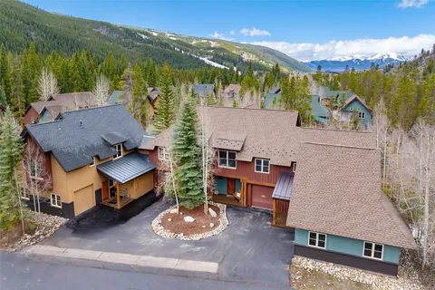 an aerial view of a house with garden view