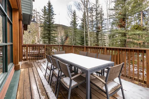 a view of a balcony with furniture