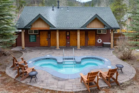 a view of a house with swimming pool