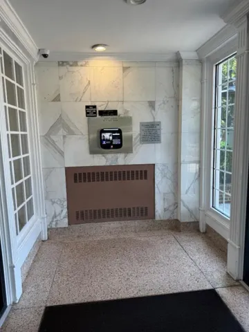 a view of kitchen with furniture and window