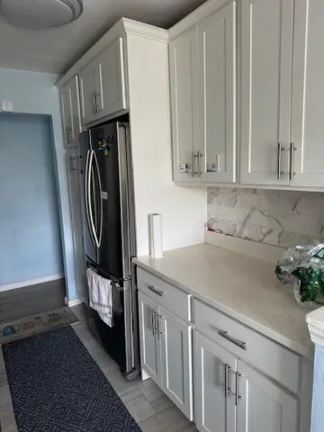 a utility room with cabinets