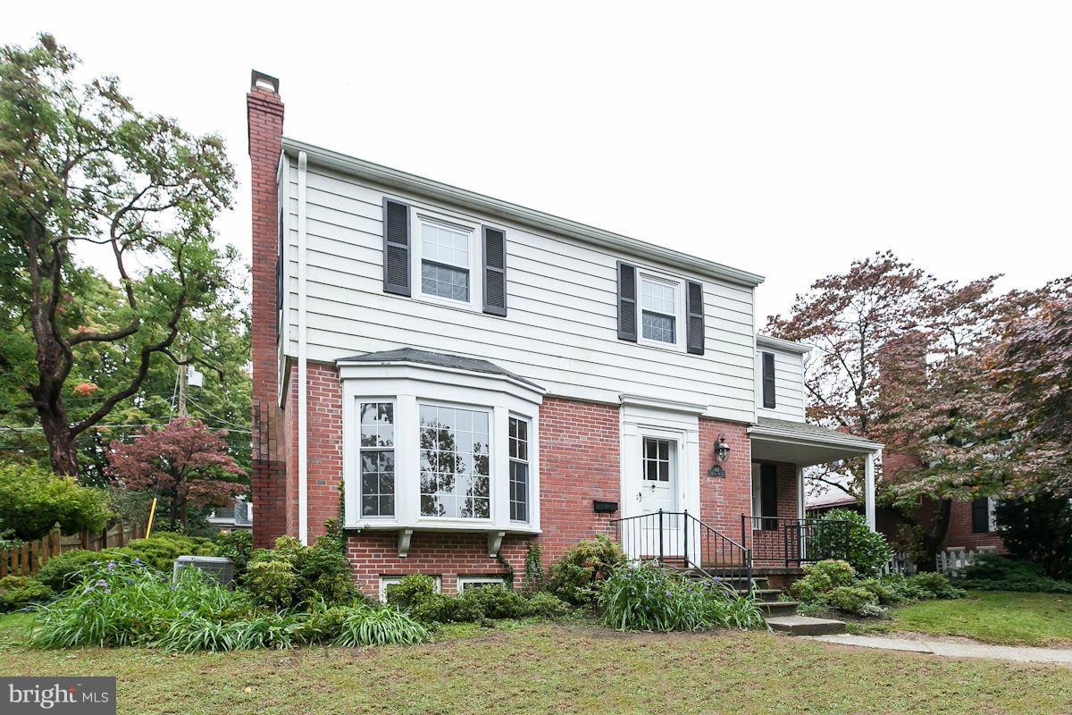 611 Wilton Road Towson, MD 21286 - Photo 1 of 30 a front view of a house with garden