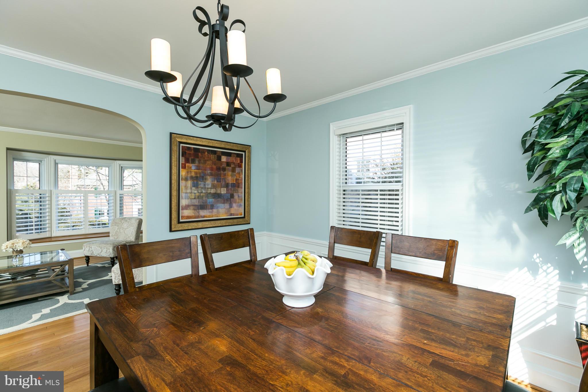 611 Wilton Road Towson, MD 21286 - Photo 11 of 30 a view of dining room and hall with wooden floor