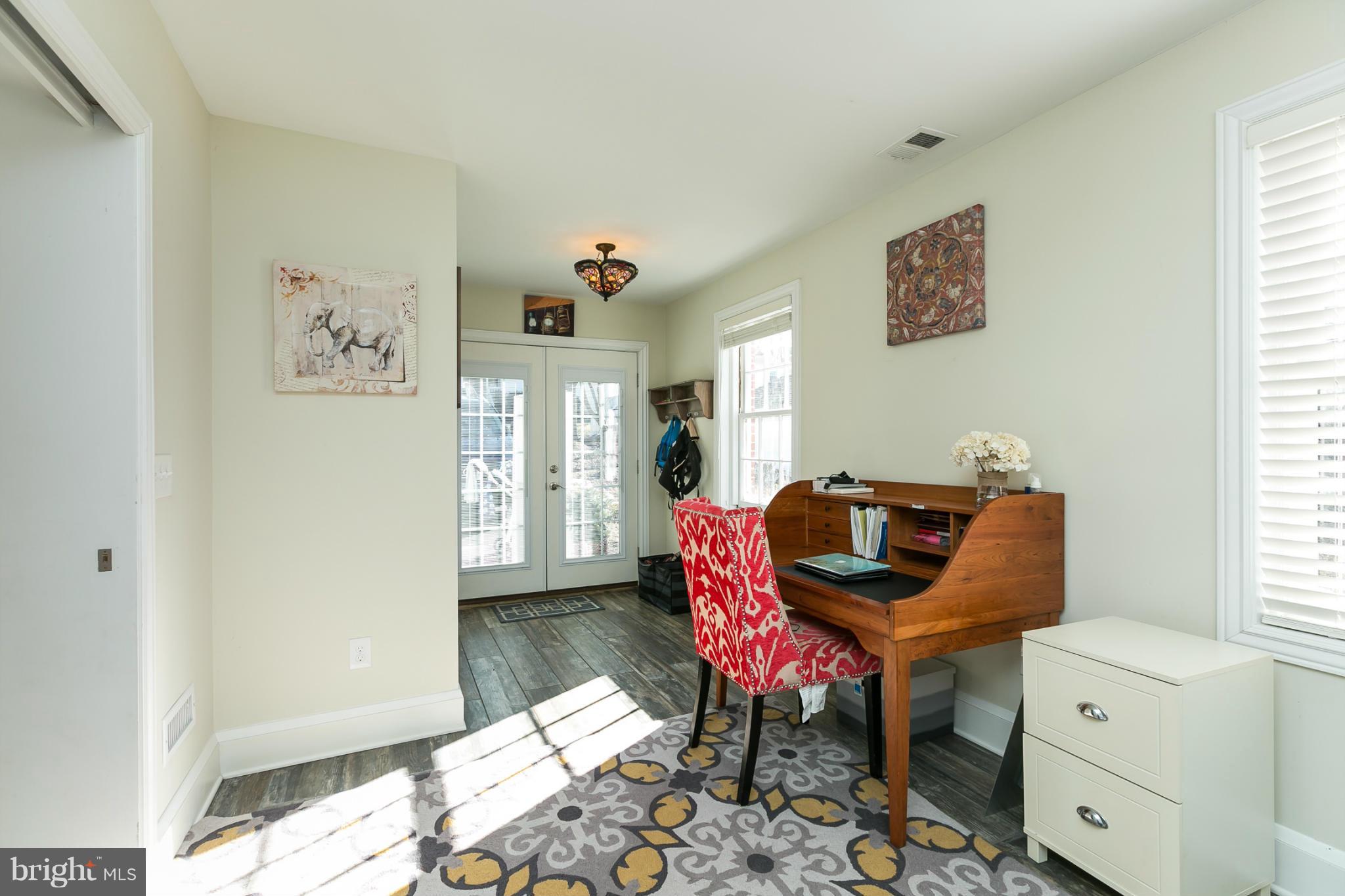 611 Wilton Road Towson, MD 21286 - Photo 14 of 30 a living room with furniture and a window