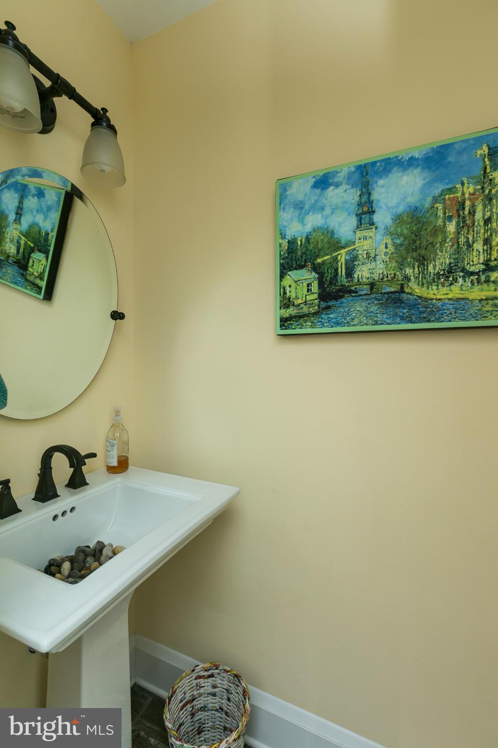 611 Wilton Road Towson, MD 21286 - Photo 15 of 30 a bathroom with a sink and a mirror