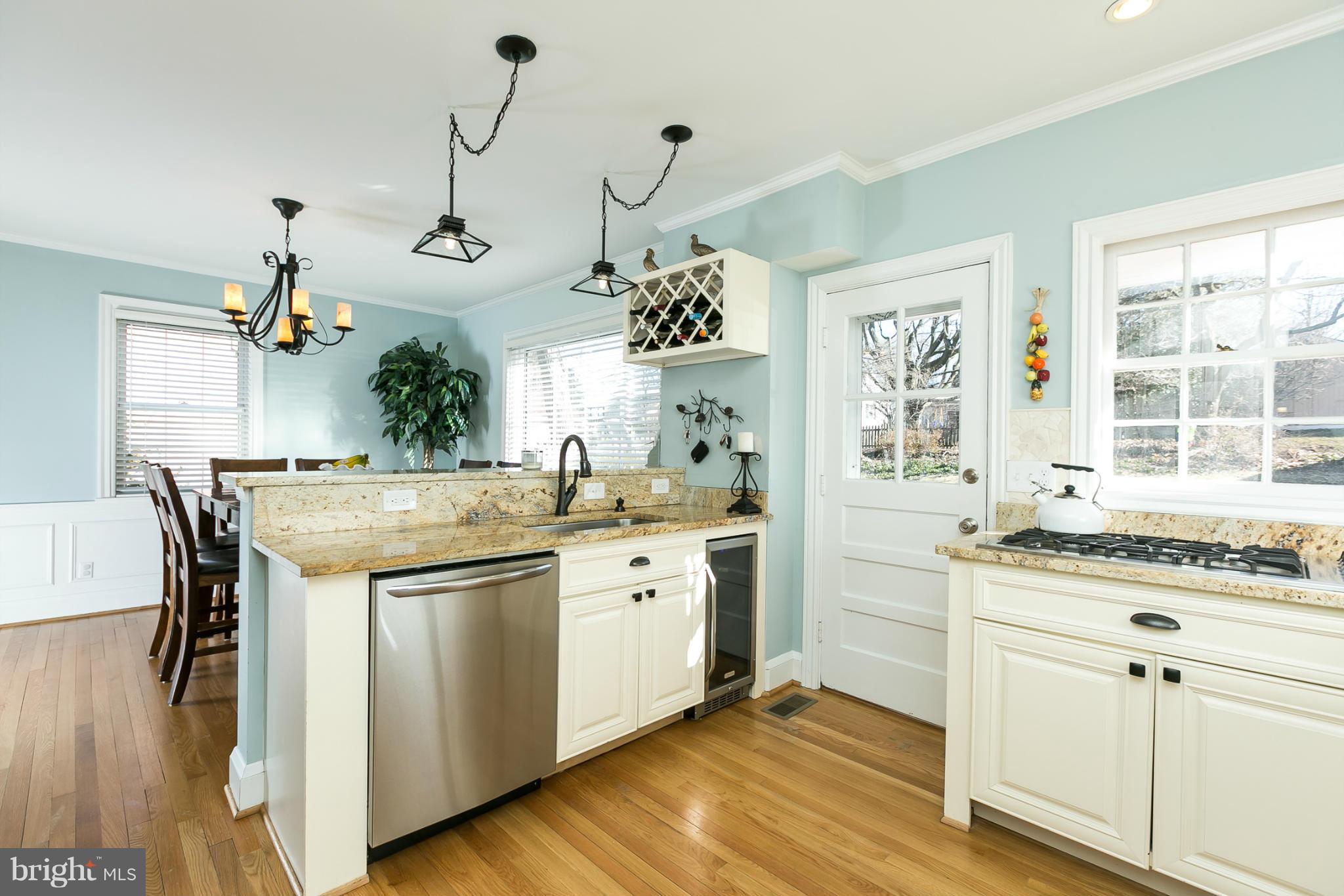 611 Wilton Road Towson, MD 21286 - Photo 3 of 30 a kitchen with a stove and cabinets