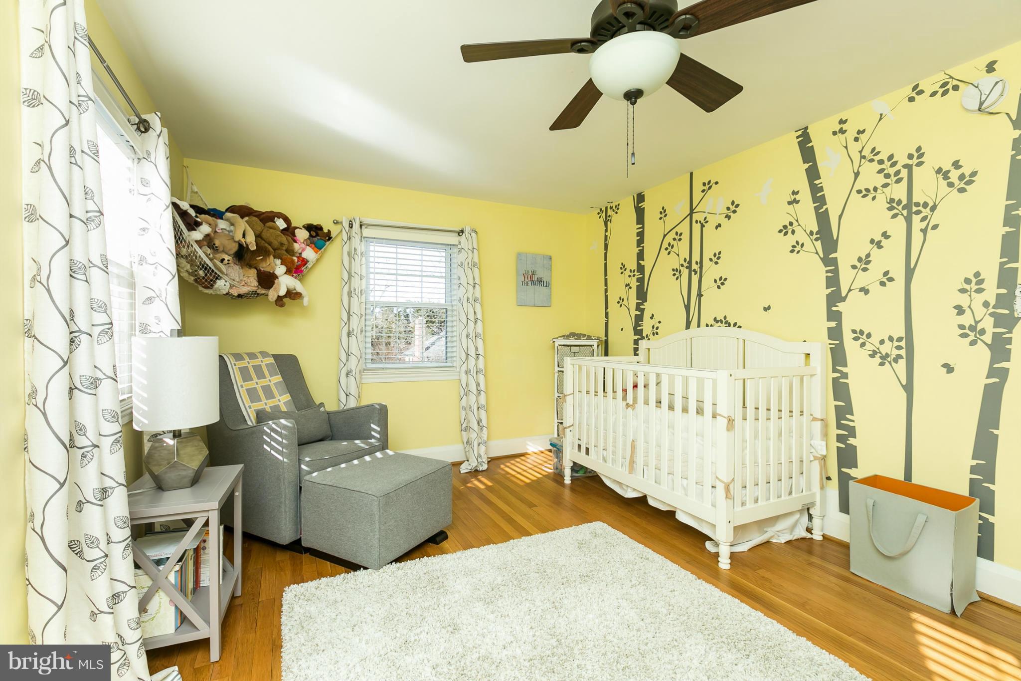 611 Wilton Road Towson, MD 21286 - Photo 21 of 30 a bedroom with furniture and a window