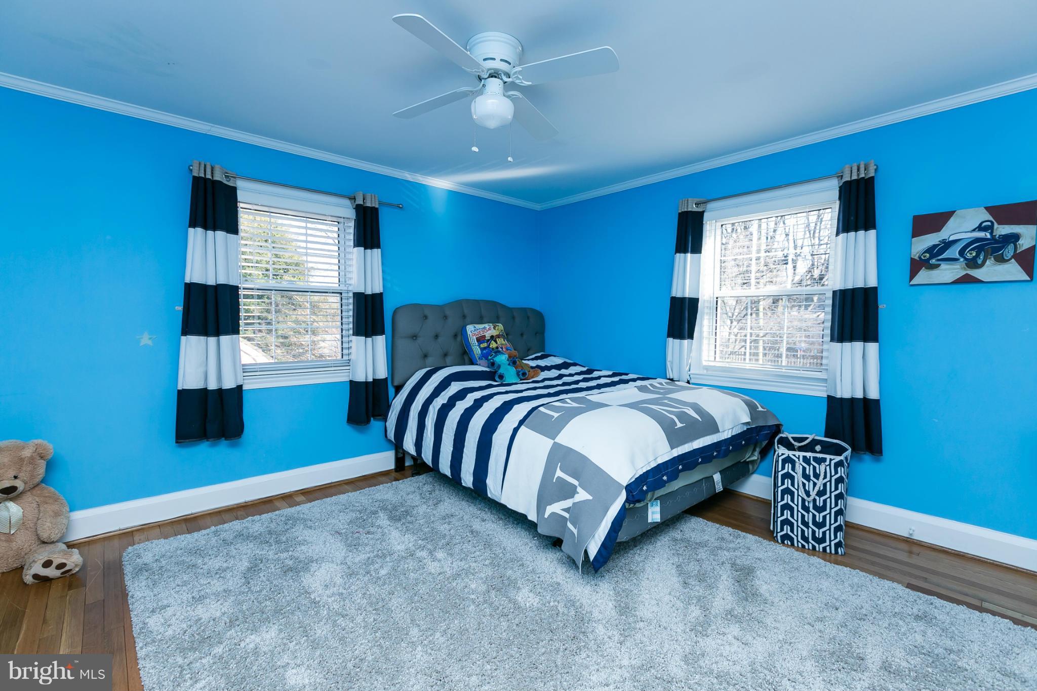 611 Wilton Road Towson, MD 21286 - Photo 23 of 30 a bedroom with a bed and dresser