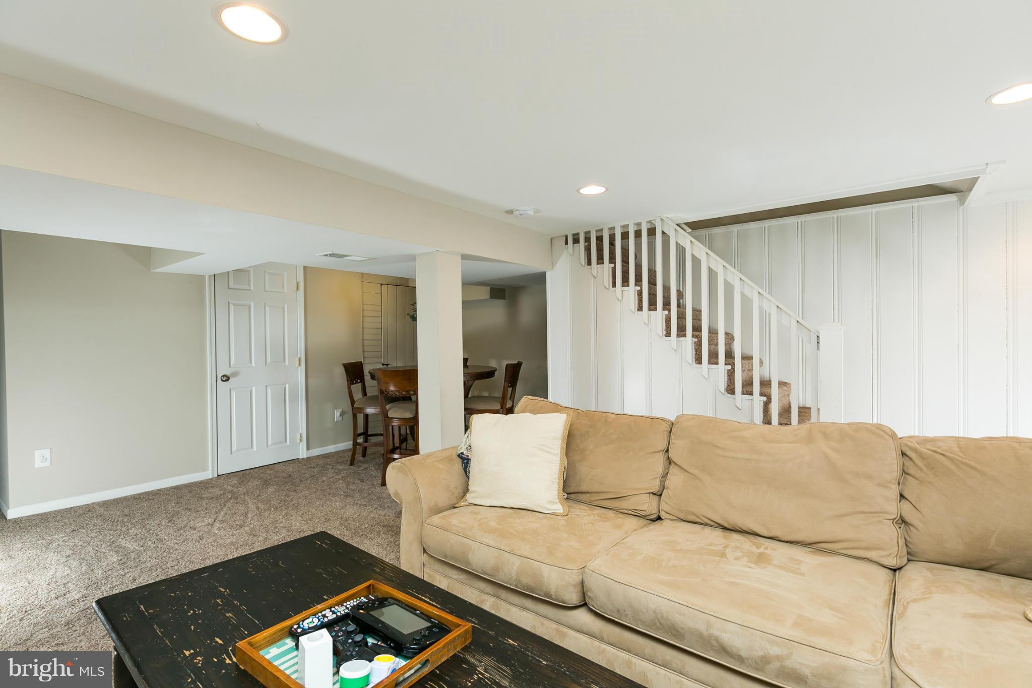 611 Wilton Road Towson, MD 21286 - Photo 27 of 30 a living room with furniture and a couch