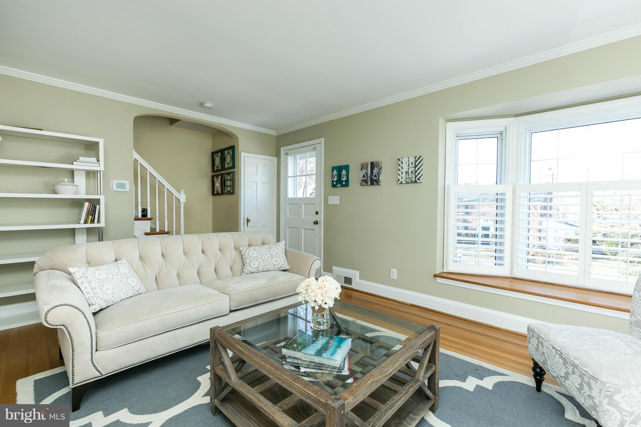 611 Wilton Road Towson, MD 21286 - Photo 8 of 30 a living room with furniture and a large window