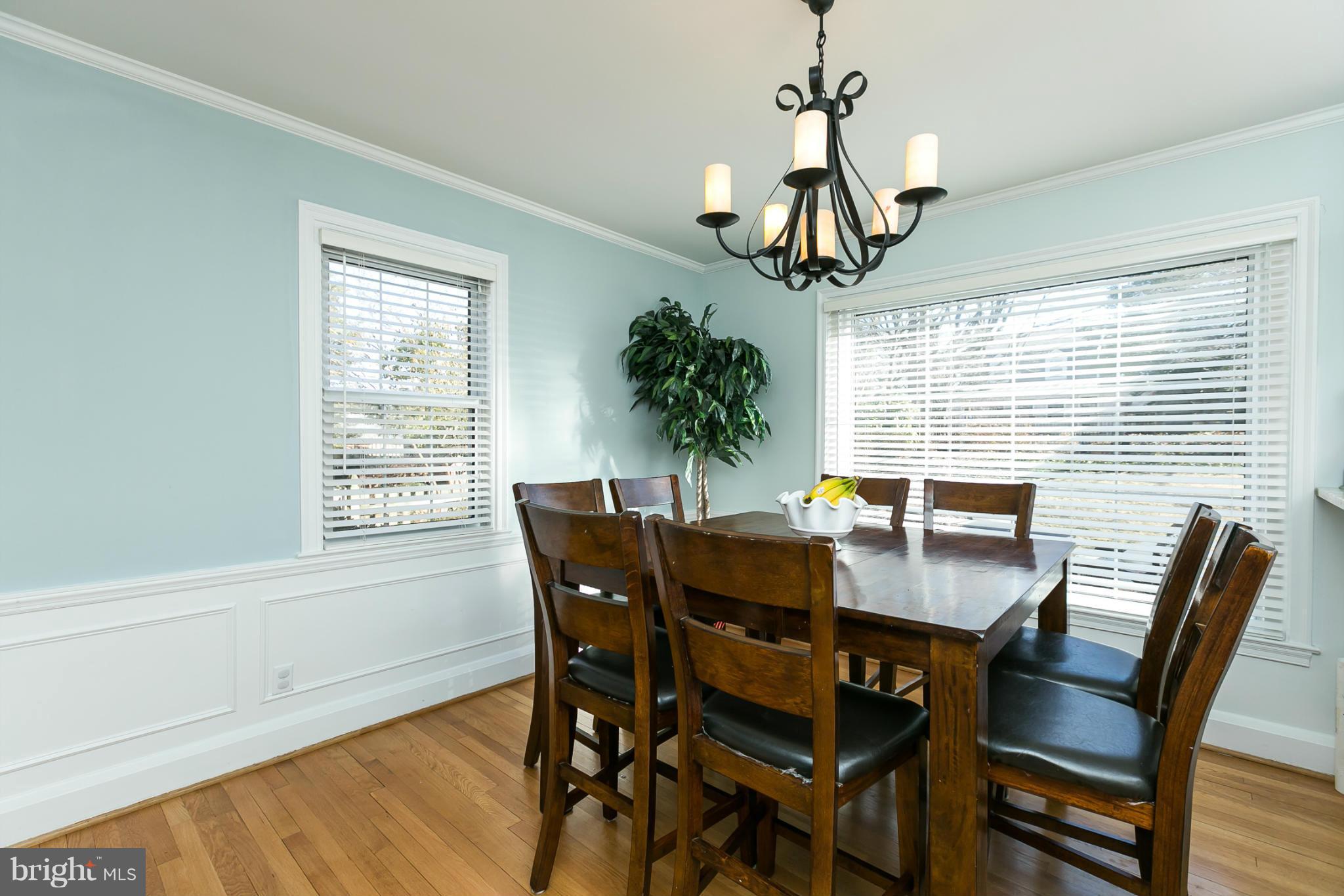 611 Wilton Road Towson, MD 21286 - Photo 10 of 30 a view of a dining room with furniture window and wooden floor