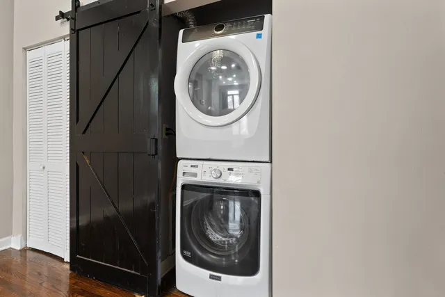 a utility room with dryer and washer