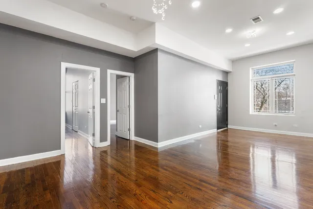 a view of entryway with wooden floor