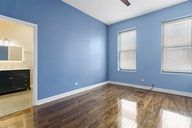 wooden floor and window in an empty room