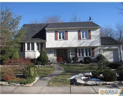 23 Phillips Road Edison, NJ 08817 - Photo 1 of 12 a front view of a house with garden