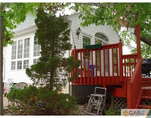 23 Phillips Road Edison, NJ 08817 - Photo 11 of 12 a view of a house with a yard