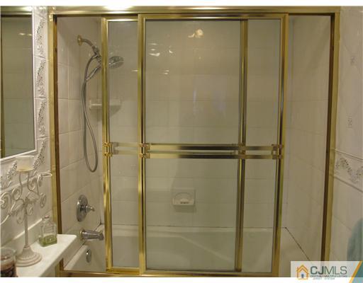 23 Phillips Road Edison, NJ 08817 - Photo 10 of 12 a bathroom with a shower