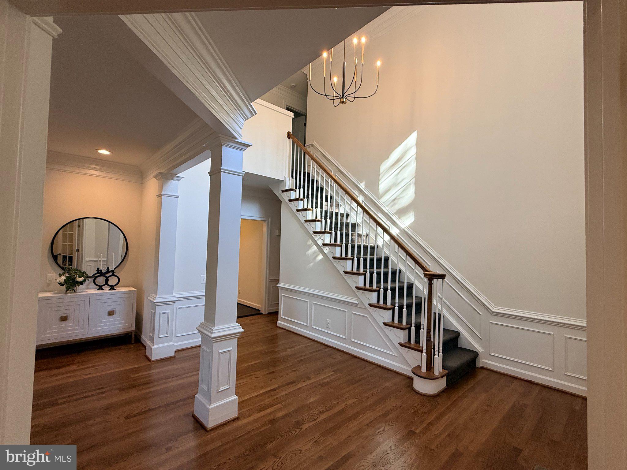 9733 Hidden Road Vienna, VA 22181 - Photo 8 of 39 Elegant foyer with grand staircase.