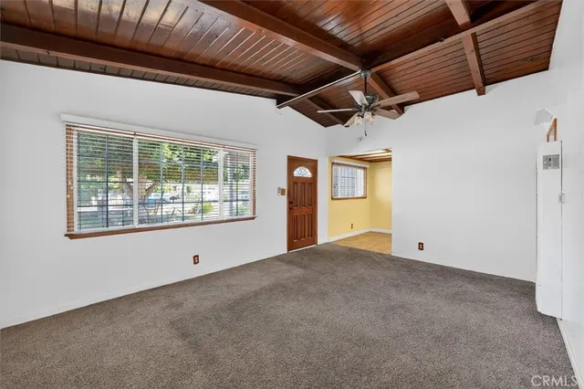 a view of empty room with windows