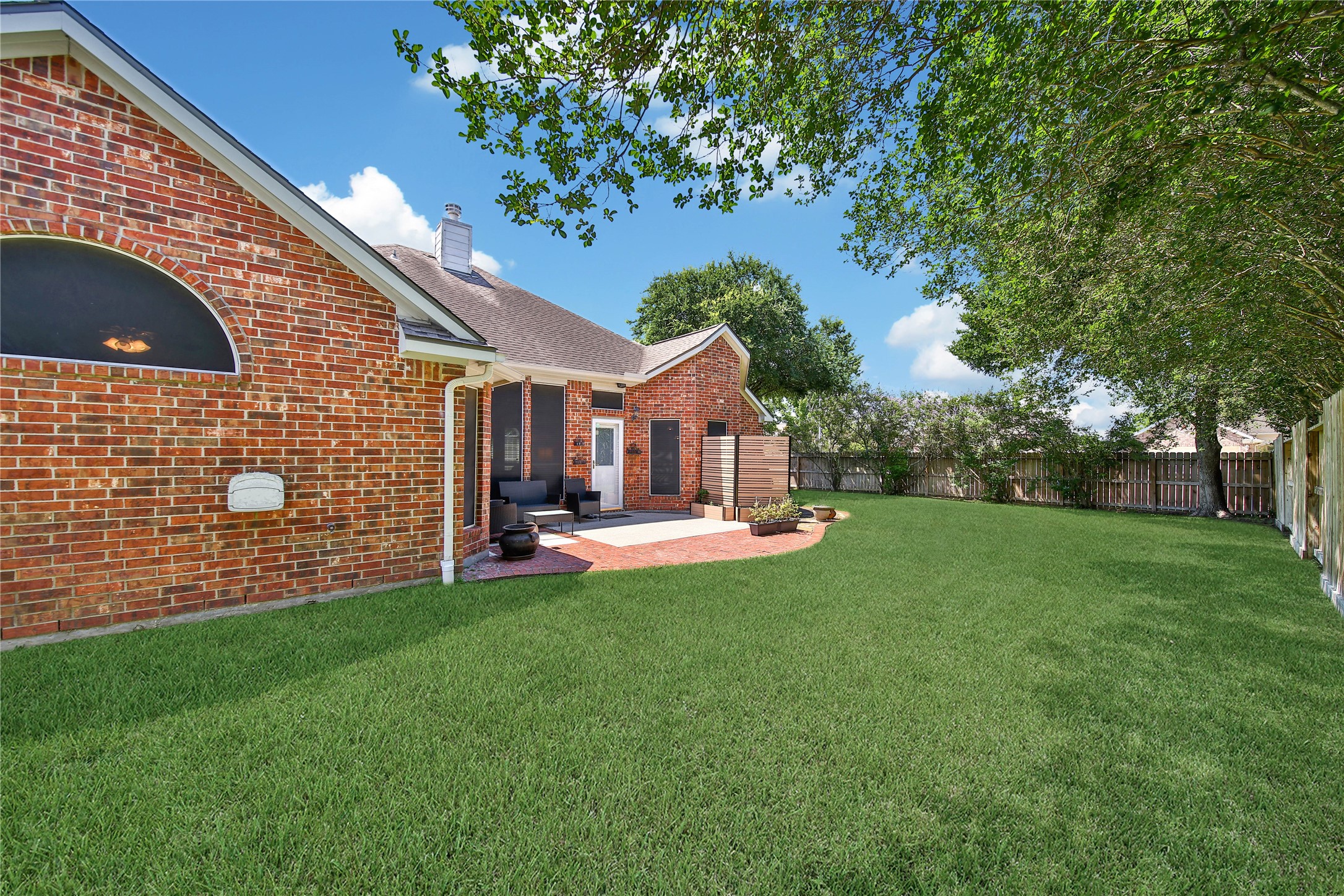 21338 Timber Pines Drive Spring, TX 77388 - Photo 27 of 29 a front view of a house with a garden
