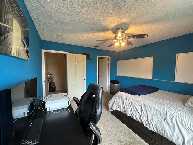 a kitchen with a stove oven and a window
