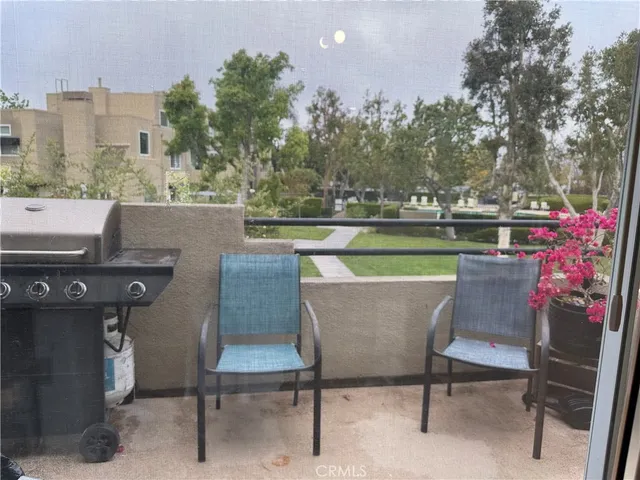 a bedroom with a bed and dresser