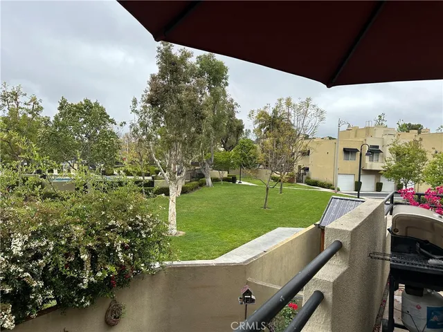 a roof deck view with a seating space