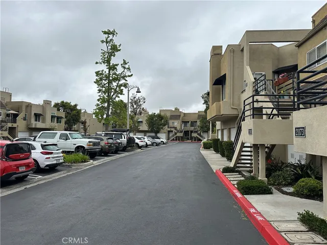 a kitchen with a refrigerator and cabinets