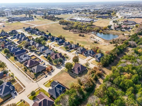 a view of a yard with an ocean