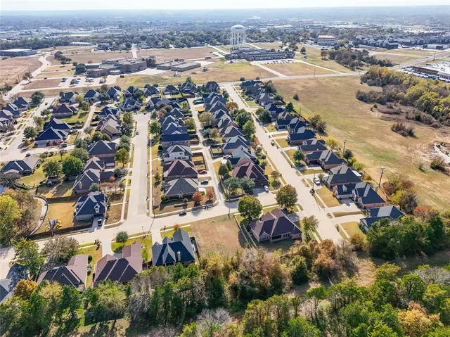 an aerial view of residential building and lake view