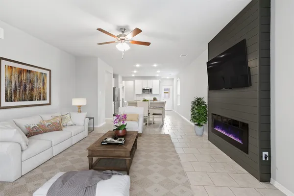 a view of a livingroom with furniture and a fireplace