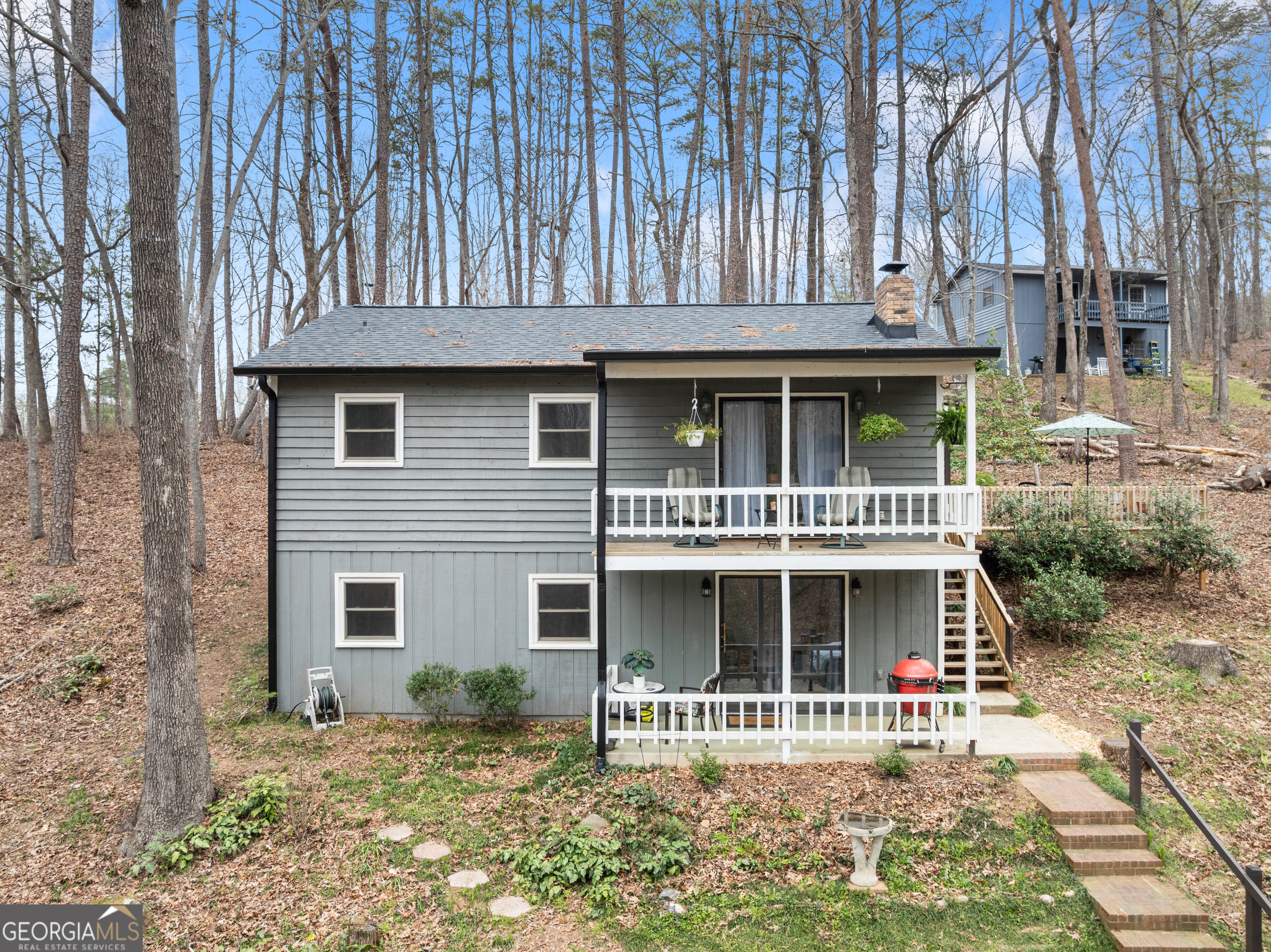 426 Skyview Circle Clarkesville, GA 30523 - Photo 1 of 42 a front view of a house with a garden